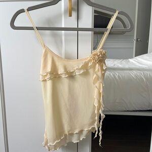 Elegant Cream Ruffle Top with rosette detail